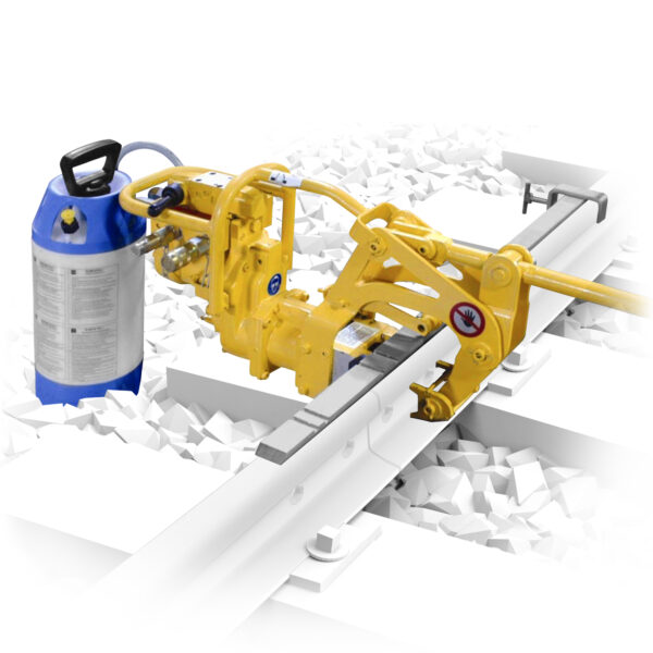 PH-R2 hydraulic carbide rail drill by Geismar clamped on a rail