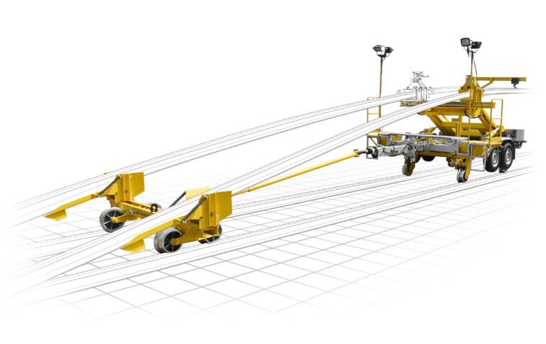 L'engin mobile de déchargement des rails modèle EMD décharge les rails le long de la voie